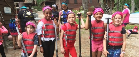 Girl Scout Troop getting ready to go canoeing at camp