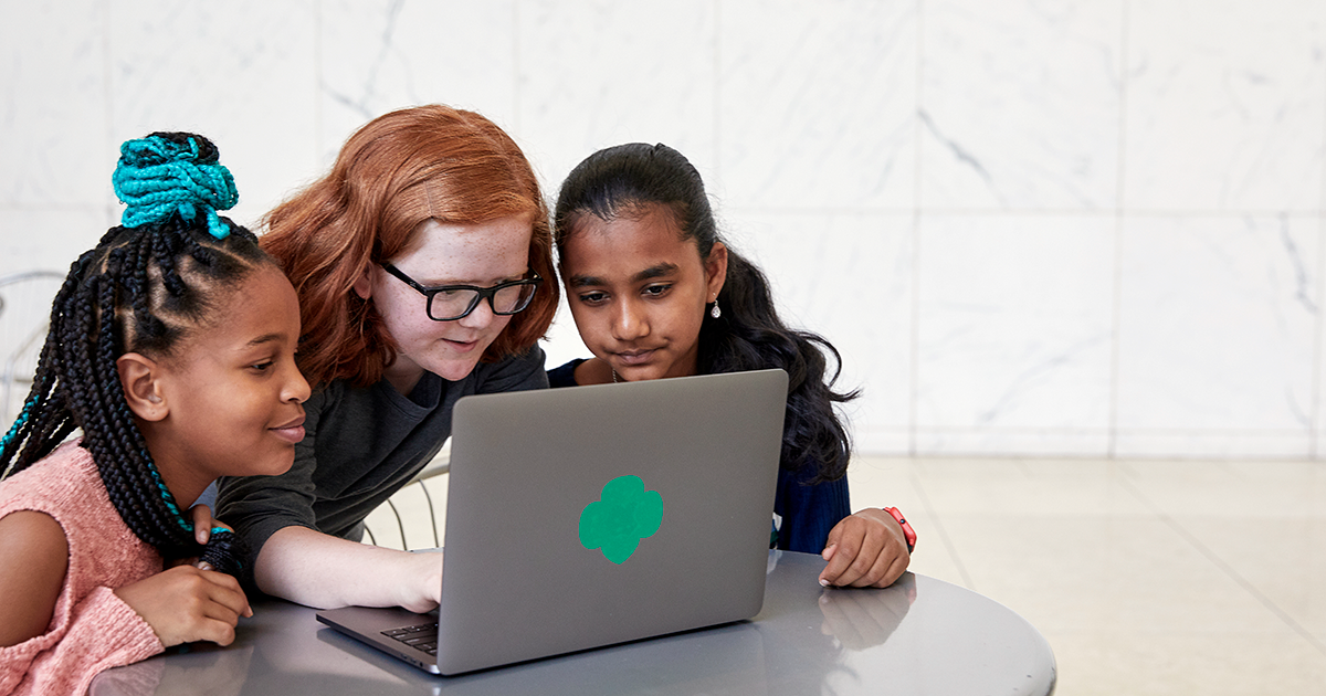 Three Girls at Computer with Trefoil